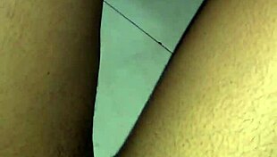 Detailed Scene of Woman Rubbing Her Creamy Wet Pussy with Fingers