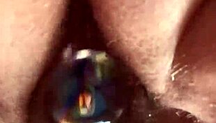 Up close, curvy girl with hairy pussy uses glass dildo for masturbation 😍