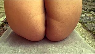 Curvy wife flaunts thong-clad ass