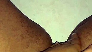 Detailed Scene of Woman Rubbing Her Creamy Wet Pussy with Fingers