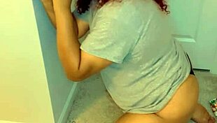 Transsexual On Knees Sucking Big Black Dildo