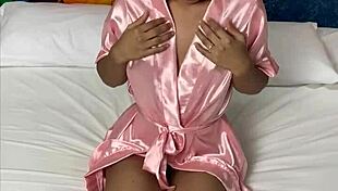 petite girl relaxes in bed fingering herself to a soft climax