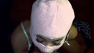 Masked beauty performs deepthroat on big black cock