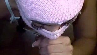 Masked beauty performs deepthroat on big black cock