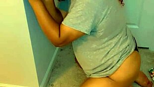 Transsexual On Knees Sucking Big Black Dildo