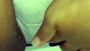 Detailed Scene of Woman Rubbing Her Creamy Wet Pussy with Fingers
