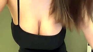 I watch my slender stepmother show her milky tits and lick her nipples