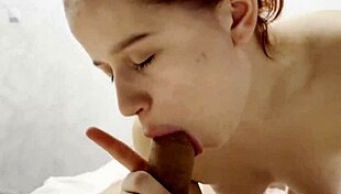 Teen swallowing a stiff cock