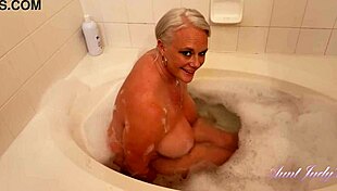 Busty hairy milf Cameron Skye bathes passionately!