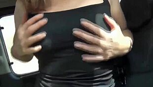 Young Adult Engages in Playful Activities in Car