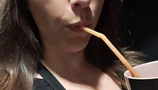 kelly kendricks smokes in the sun, showing lots of cleavage 😎