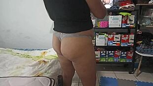 Sexy stepmom cleans bedroom in thong, records for stepson?