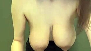 I watch my slender stepmother show her milky tits and lick her nipples