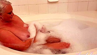 Busty hairy milf Cameron Skye bathes passionately!