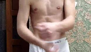 Flex skinny boy in underwear