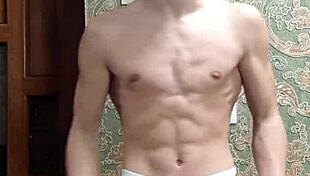 Flex skinny boy in underwear