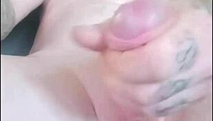 Solo jerkoff session ends in massive cumshot.