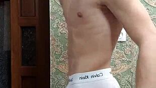 Flex skinny boy in underwear