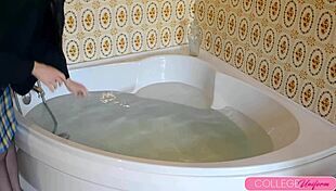 Sophia Smith jumps into the bathtub fully clothed for splashy fun.