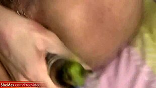 super slim ladyboy strips out of lingerie and fucks eggplant