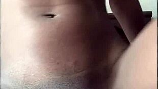 Petite woman dances alone in bedroom