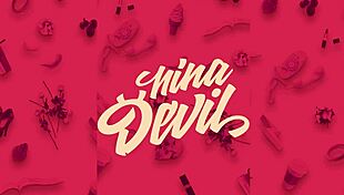 red fetish outfit with pierced nipples and tattoos.