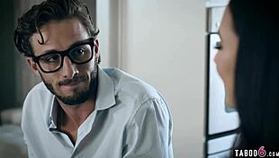 Young woman outsmarts coworker in kitchen after work