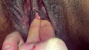 Black wet pussy fingered by white guy in contrasting interracial scene.