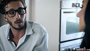 Young woman outsmarts coworker in kitchen after work