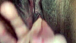Black wet pussy fingered by white guy in contrasting interracial scene.