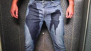 Guy Pees Inside His Jeans and Finishes with a Cumshot Outdoors