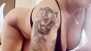 Big boobs burst out from black bra