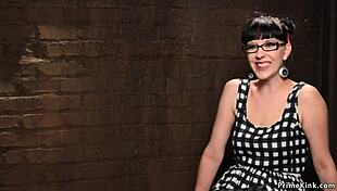 Ebony and brunette are getting toyed on in a hogtie setup, so kinky