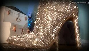 mesmerizing her slave with sparkling boots in femdom domination