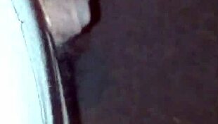 guy sneaks a pee on the empty street corner