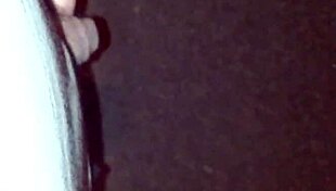 guy sneaks a pee on the empty street corner