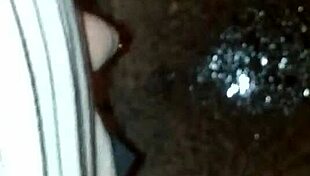 guy sneaks a pee on the empty street corner