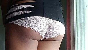 adorable latina chaparrita poses playfully in her vibrant neighborhood surroundings daily