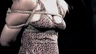 tied-up bdsm sub rides dildo under master's domination