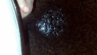 guy sneaks a pee on the empty street corner