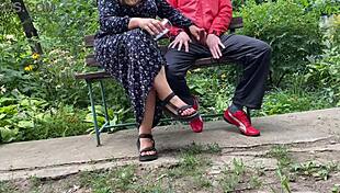 Mature woman handles huge shaft outdoors into glass