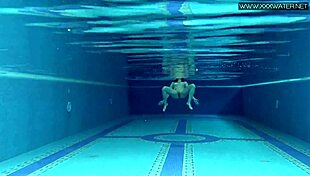 Lady Dee cute shy czech teen swimming in pool with petite body