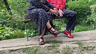 Mature woman handles huge shaft outdoors into glass