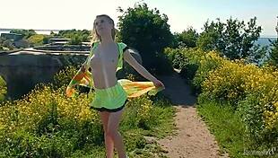 Spunky 18+ Teen Model Strips Naked Outdoors in Miniskirt Photoshoot Golden Temptation