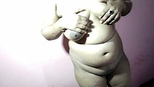 Curvy Indian amateur pounds big natural tits masturbating on bed