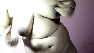 Curvy Indian amateur pounds big natural tits masturbating on bed