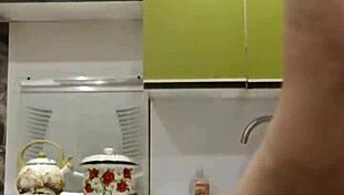 Raven-haired petite 18+ chick rubs her tight shaved pussy then fucks it hard in kitchen 