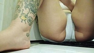 Tattooed Latina Fingers Pussy in Work Bathroom