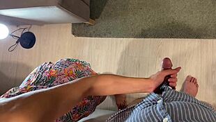 Skinny brunette teases huge cock in kitchen, strokes without letting him cum