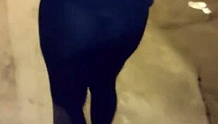 curvy mature whore flashes huge ass in see-through leggings on street